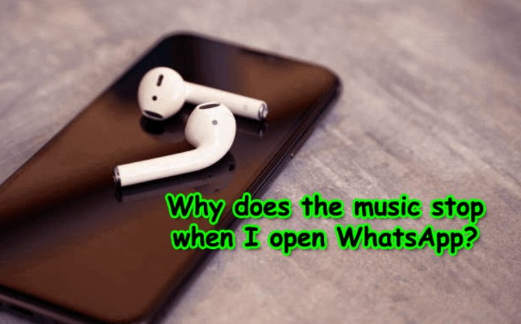 Why does the music stop when I open WhatsApp?
